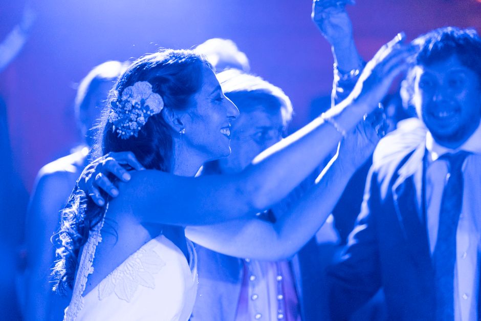 Joyful wedding reception dancing