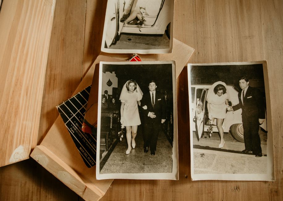 Elegant wedding photo album open on a table